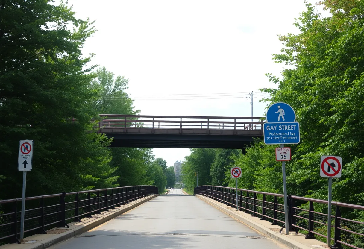 A view of the Gay Street Bridge featuring pedestrian safety signs.