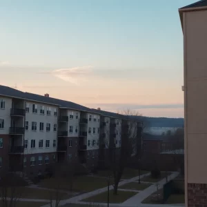 Serene view of an apartment complex in Knoxville, representing family struggles.