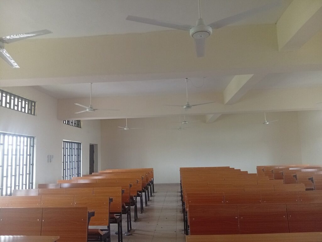 Empty classroom with rows of desks
