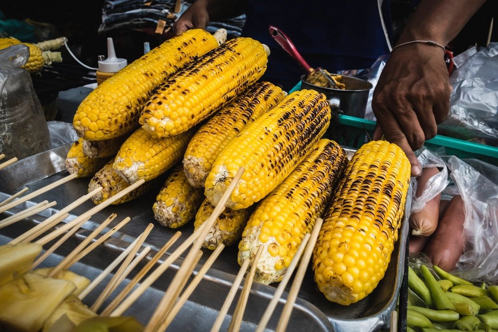 Outdoor festival with food vendor tents